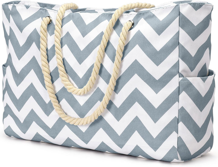 Fashionable waterproof large beach tote for women, with secure zipped sections.