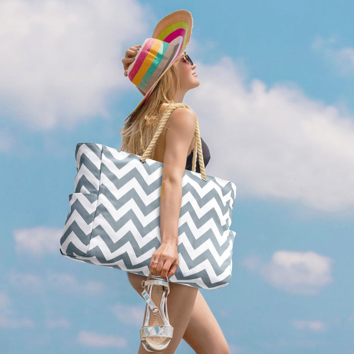 Women's flexible waterproof large utility bag, adaptable with secure zipped compartments.