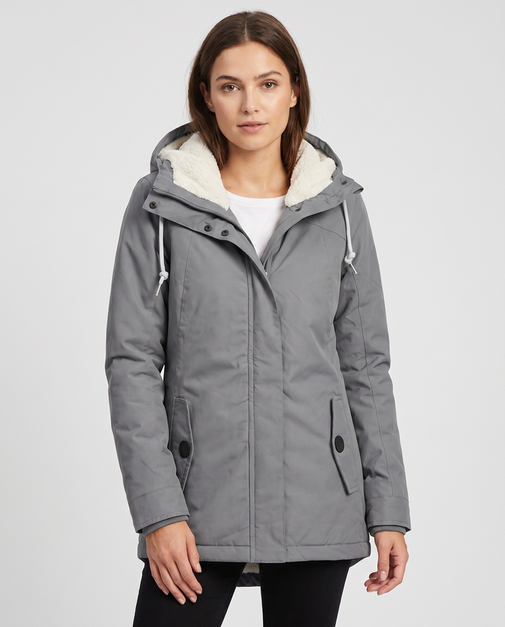 Stylish women's hooded rain jacket, weatherproof and durable for everyday outdoor wear.
