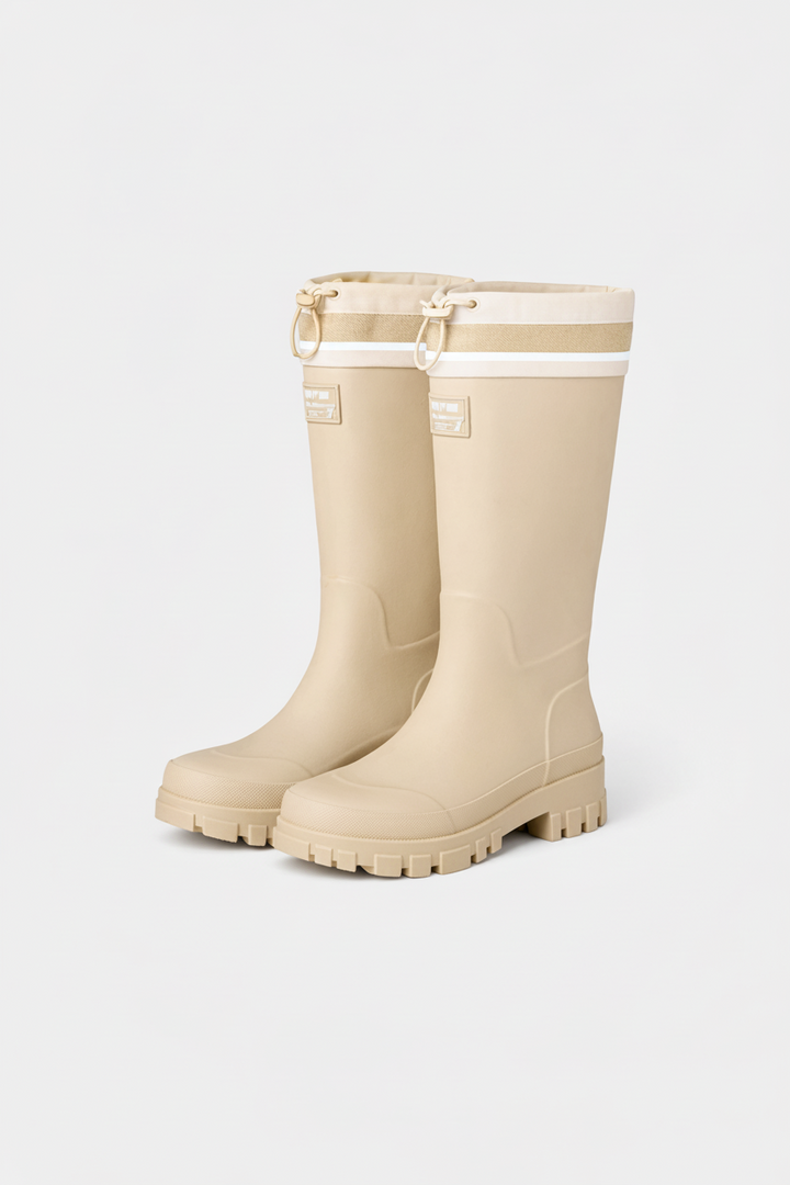 Women's waterproof slip-on rain boots, durable for wet weather protection.