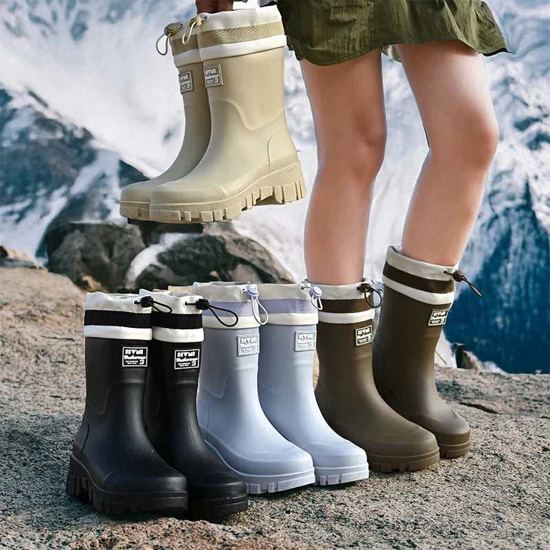 Black women's waterproof outdoor boots, durable slip-on for all seasons.