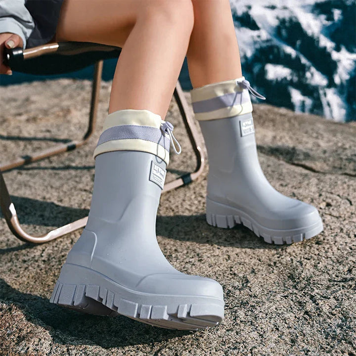 Durable women's waterproof slip-on boots, great for muddy conditions.