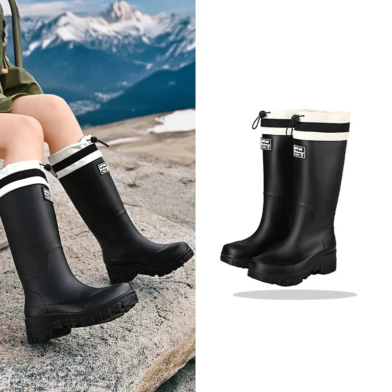 Heavy-duty women's rain boots, durable and slip-on for all weather conditions.