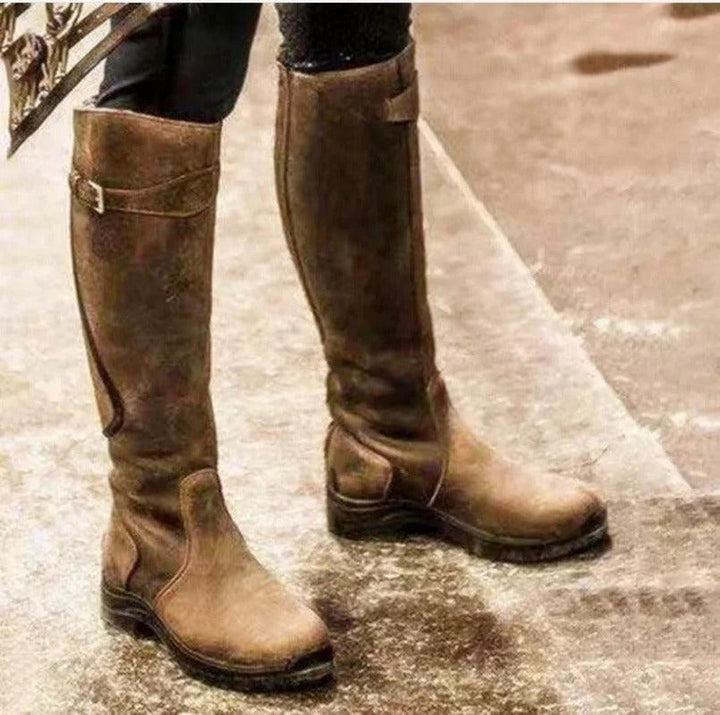 Stylish women's winter boots. Fashionable & waterproof riding boots, perfect for ladies' all-weather outdoor wear.