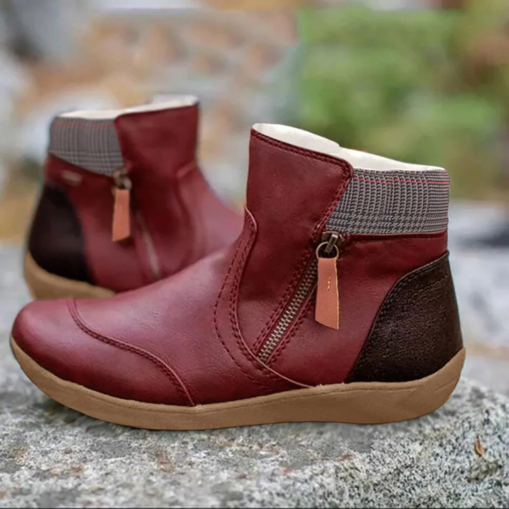 Women's weather-resistant winter boots. Ankle-height, lace-up style for cozy, cold-day protection & outdoor comfort.