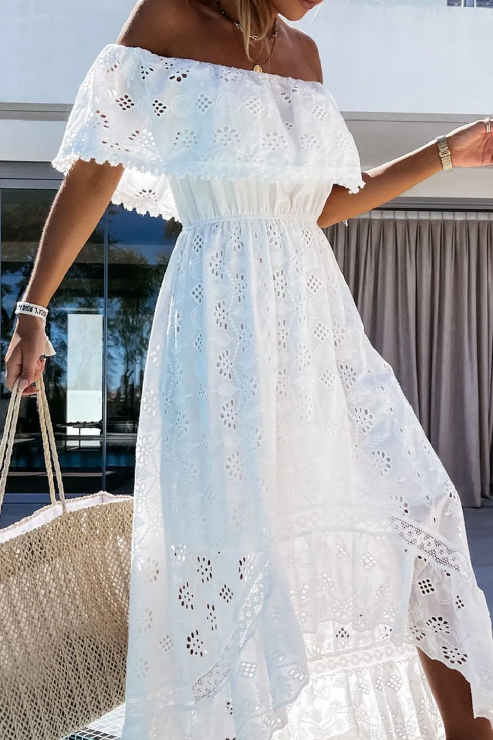 Front view of a white lace off-shoulder high-low dress, ruffled hem, perfect for summer wedding guests.