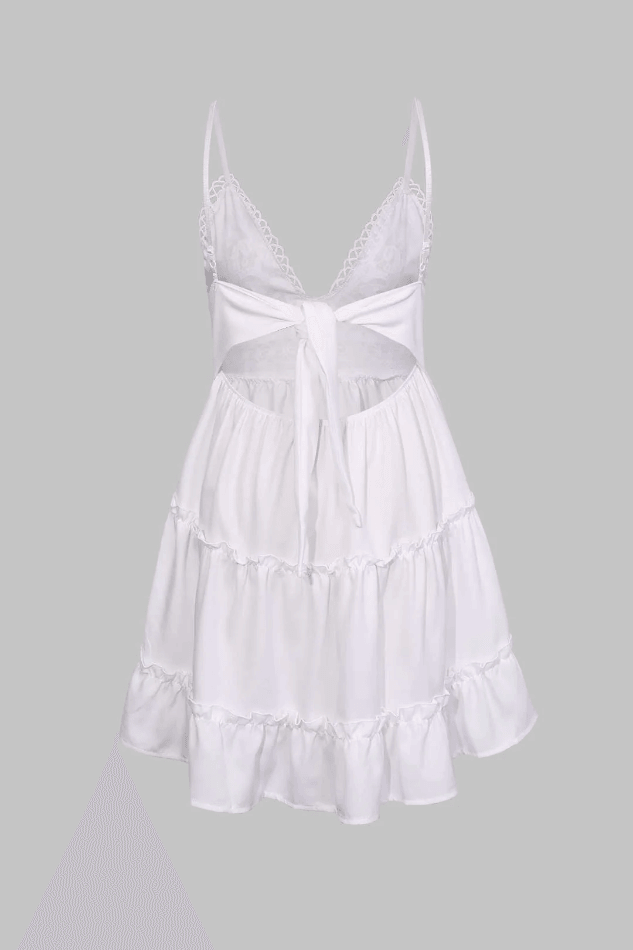 Flowy white mini ruffle V-neck dress for women, ideal for summer parties, beach evenings, or vacation.