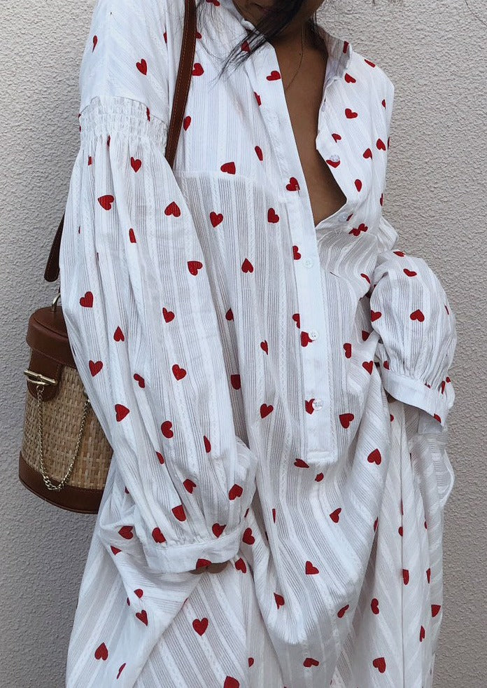 Elegant long sleeve white maxi shirt dress for women, featuring romantic embroidered heart details.