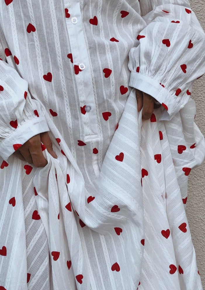 Women's white summer maxi dress, oversized style with pretty heart embroidery and long sleeves.