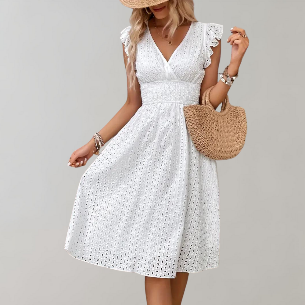 Stylish white midi dress for women, featuring delicate ruffled sleeves, ideal for warm weather comfort.