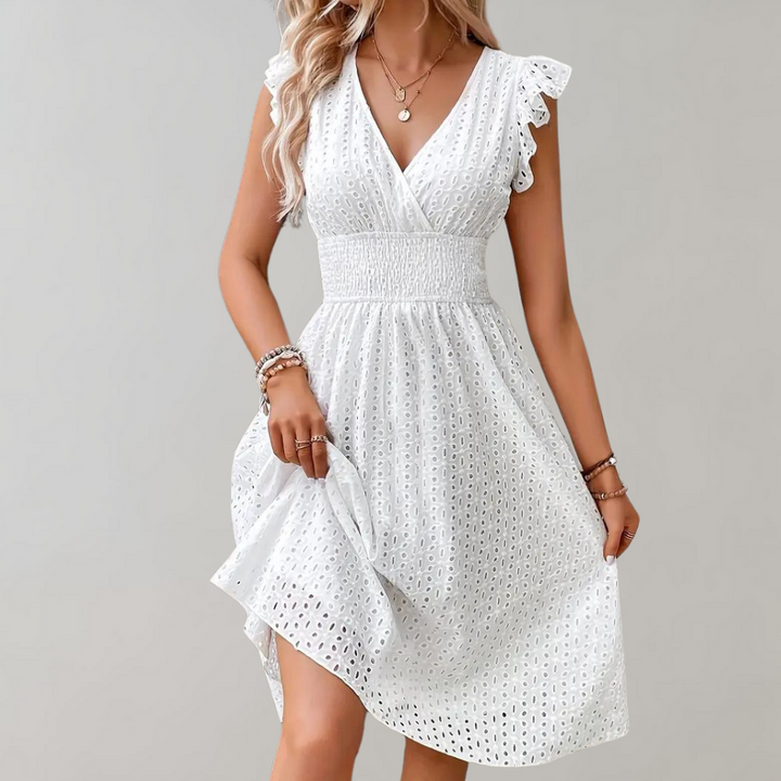 Casual women's white day dress with charming ruffled sleeves, a versatile and airy summer piece.
