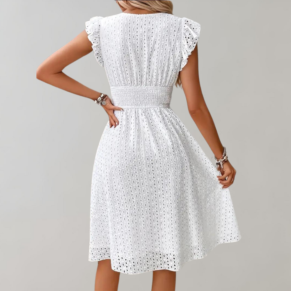 Flattering white midi dress with ruffled sleeves for women, a must-have for your summer wardrobe.