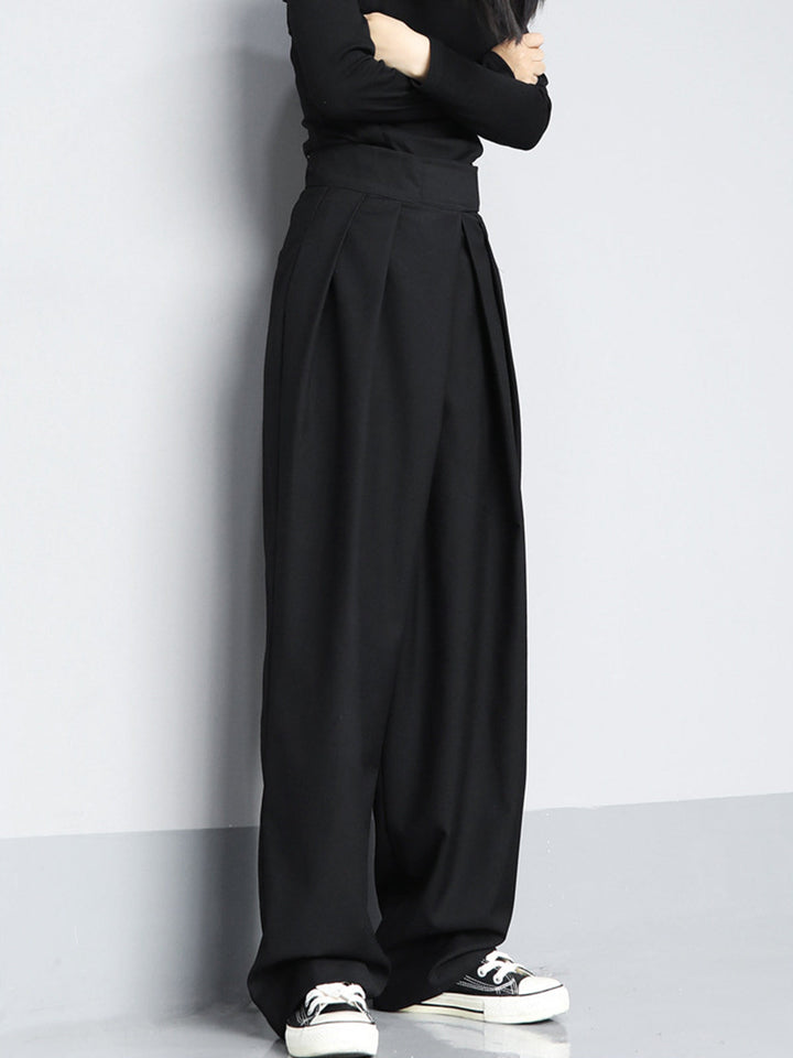 Women's wide leg pants with velcro waist. Flowy, comfortable, and chic for everyday wear.