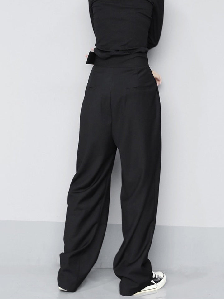 Adjustable velcro waist wide leg trousers for women. Pleated, comfortable, and stylish for any occasion.