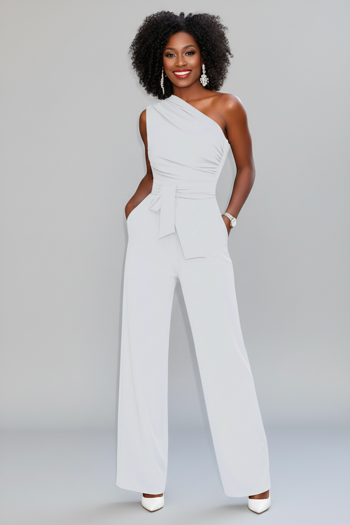 Women's wide-leg short sleeve jumpsuit with a flattering belted waist in a chic solid color, perfect for summer.
