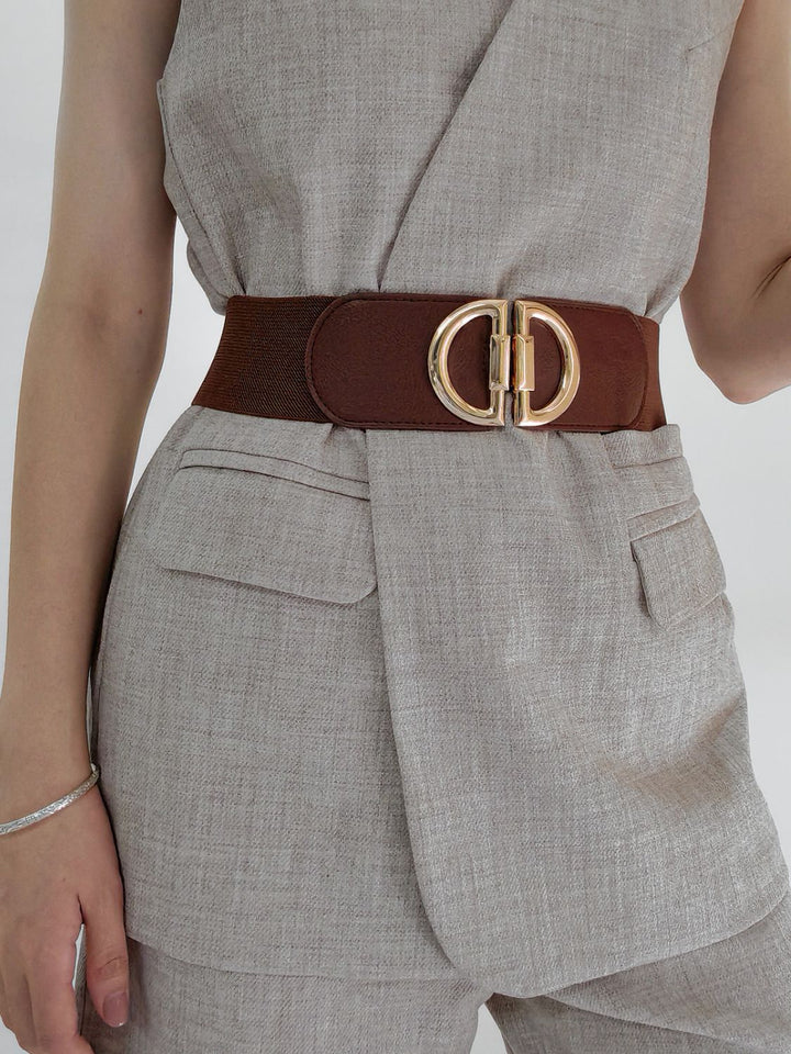 Women's wide stretchy waist belt with a sleek stylish buckle, perfect for dresses and tunics.