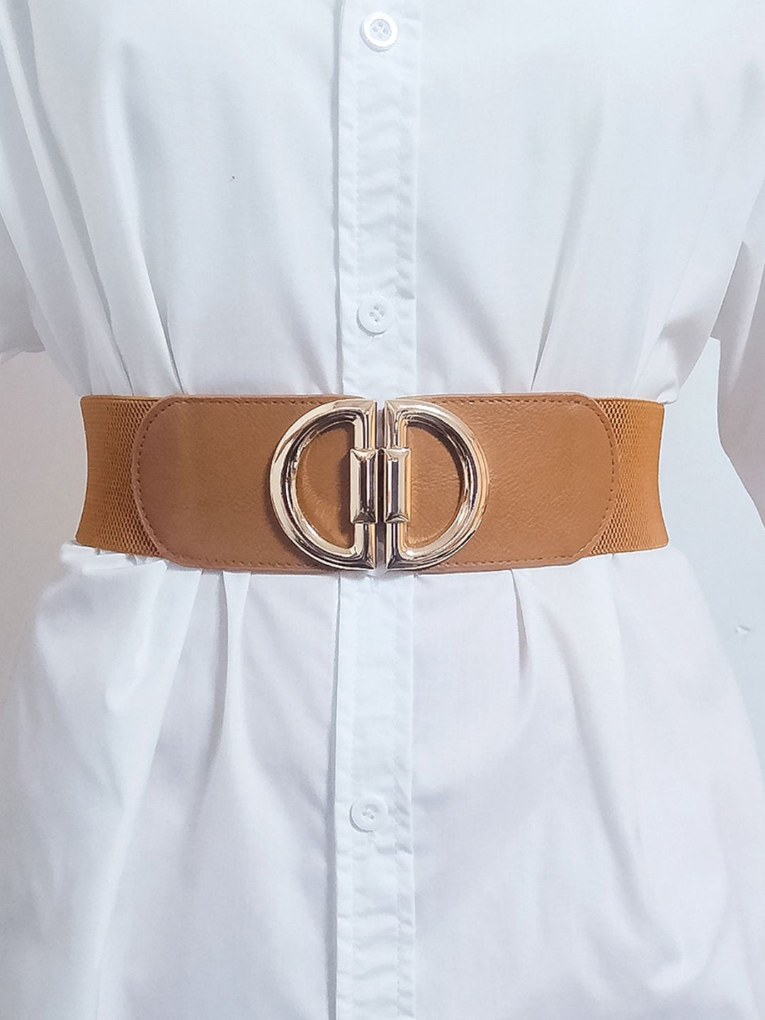 Elegant women's wide stretch belt with a unique metallic buckle, adding sophistication to any outfit.