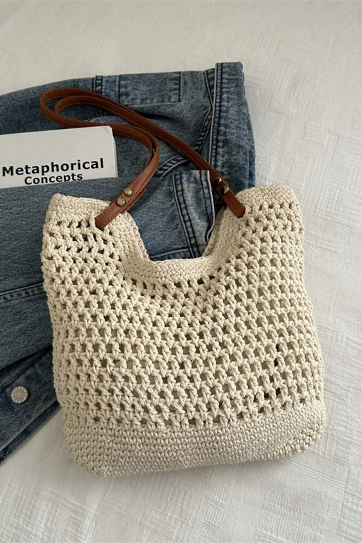 Eco-friendly ivory woven cotton shoulder bag for women. Casual everyday tote, lightweight and stylish fabric accessory.
