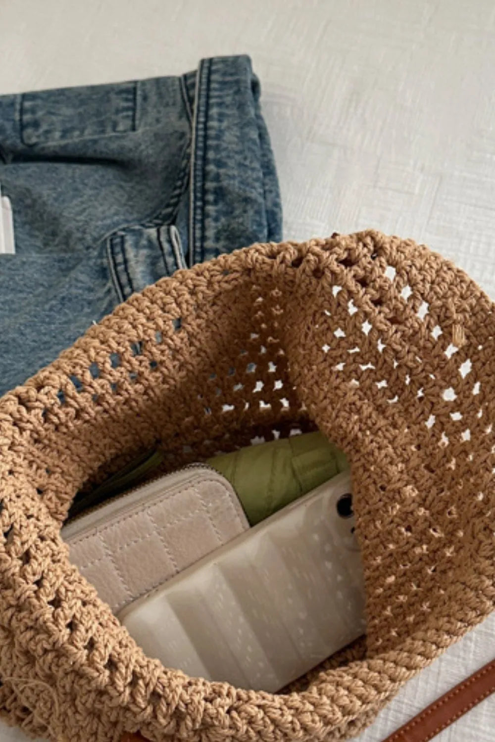 Chic women's woven cotton shoulder bag in ivory, perfect for a casual boho look. Lightweight and eco-friendly.