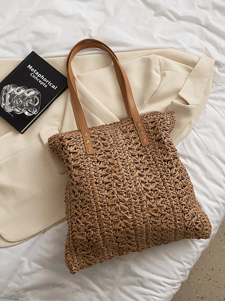 Hand-woven straw shoulder bag for women, an essential casual summer and beach vacation accessory.