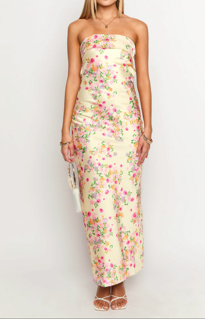Light & airy yellow floral women's maxi dress, a stylish strapless summer outfit for vacation.