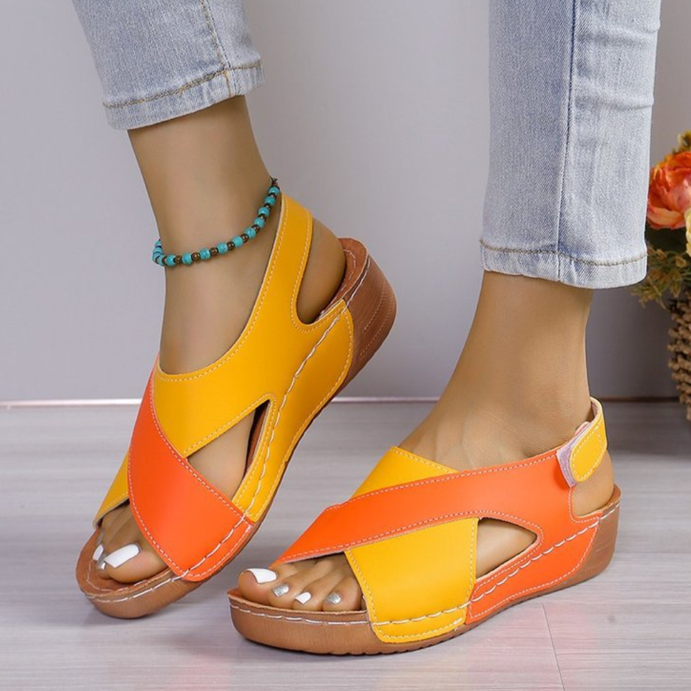 Stylish Yola open-toe flat sandals for women, great for summer fashion & comfort.