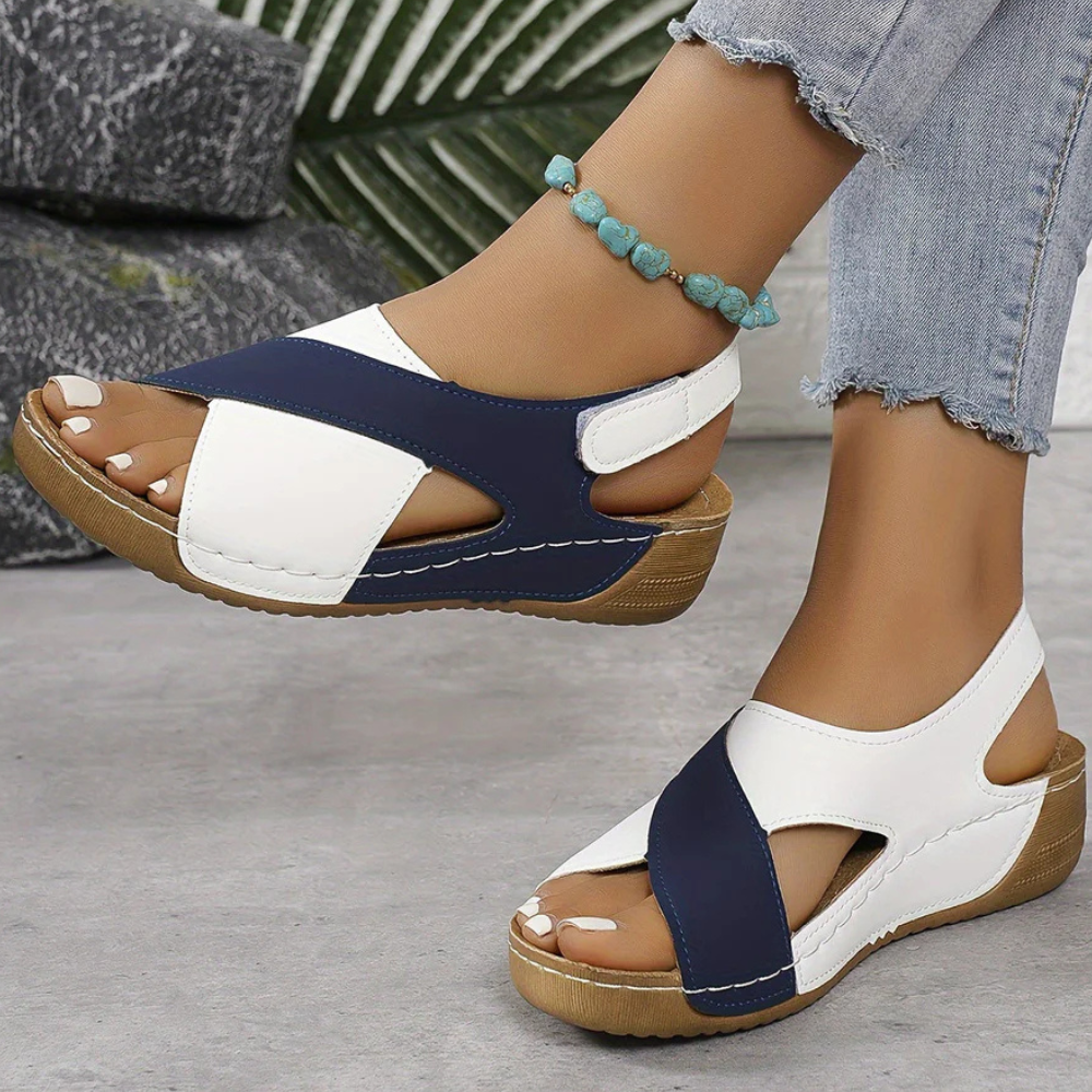 Women's Yola flat sandals with adjustable straps, providing ultimate comfort for summer.