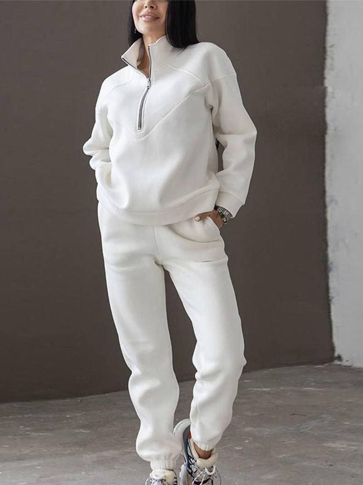 Full women's matching tracksuit set. Zip neck top & pants offer effortless casual style and comfy everyday wear.