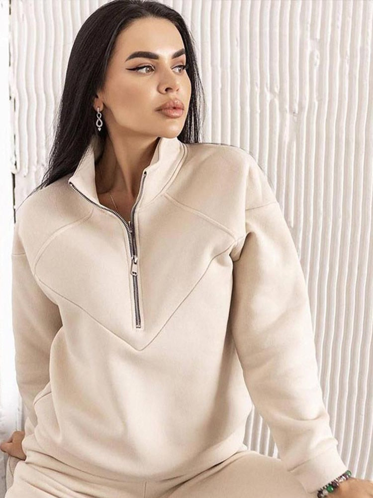 Stylish women's zip neck tracksuit. Soft fabric two-piece set for ultimate comfort & casual everyday loungewear.