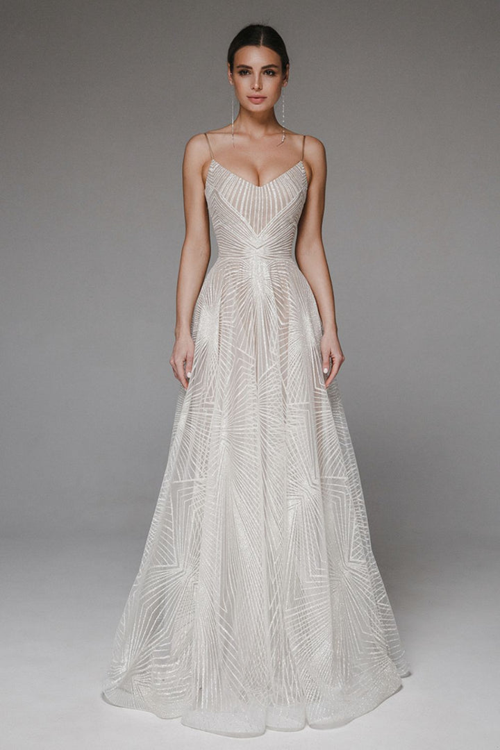 Women's A-Line evening dress with chiffon overlay, geometric pattern, and spaghetti straps, elegant for formal occasions.