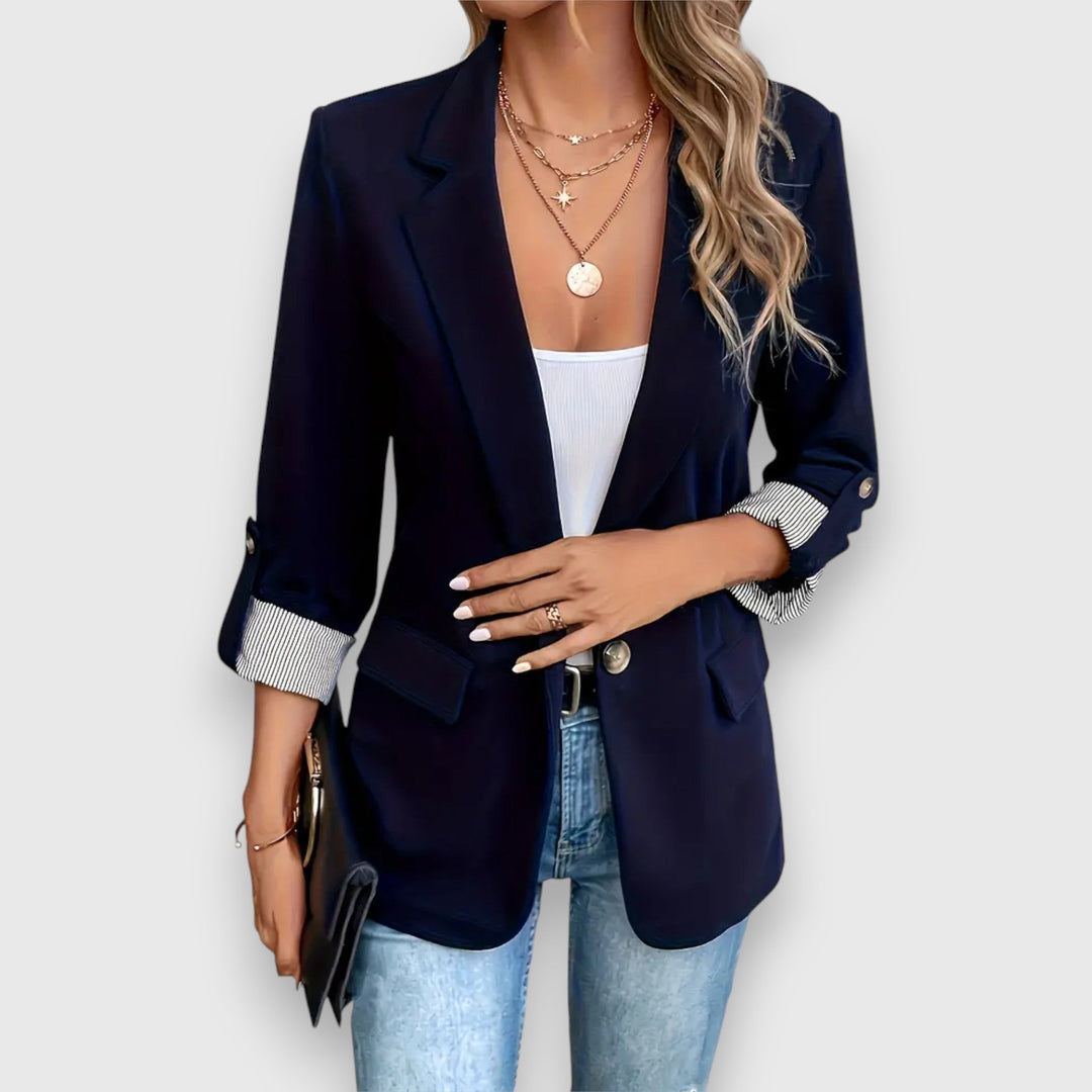 "Women's blazer with notched lapels and rolled cuff sleeves, tailored fit in black, ideal for professional or casual wear."