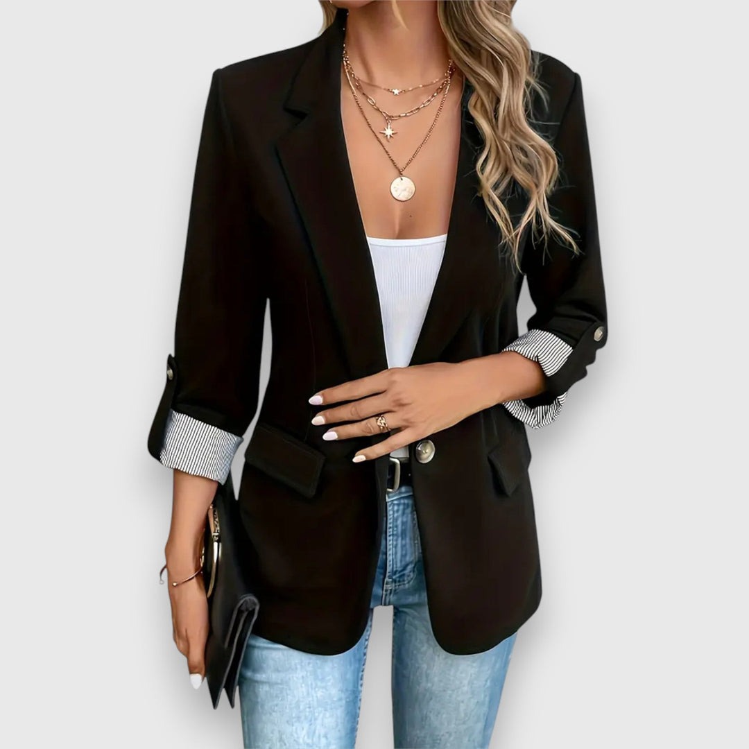 "Women's blazer with notched lapels and rolled cuff sleeves, tailored fit in black, ideal for professional or casual wear."