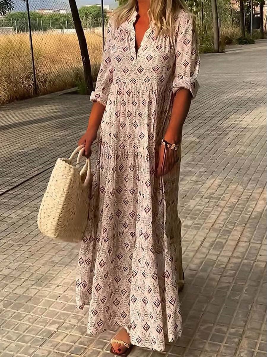 "Women's Bohemian V-Neck Maxi Dress in flowing fabric with 3/4 sleeves, perfect for summer occasions and versatile styling."