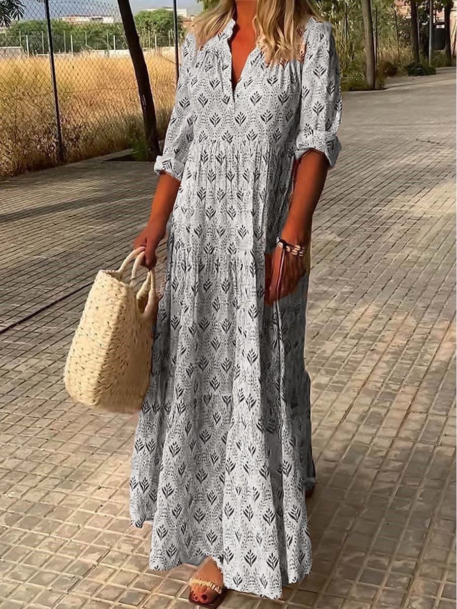 "Women's Bohemian V-Neck Maxi Dress in flowing fabric with 3/4 sleeves, perfect for summer occasions and versatile styling."