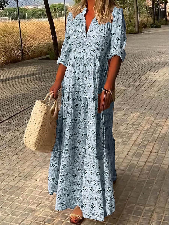 "Women's Bohemian V-Neck Maxi Dress in flowing fabric with 3/4 sleeves, perfect for summer occasions and versatile styling."