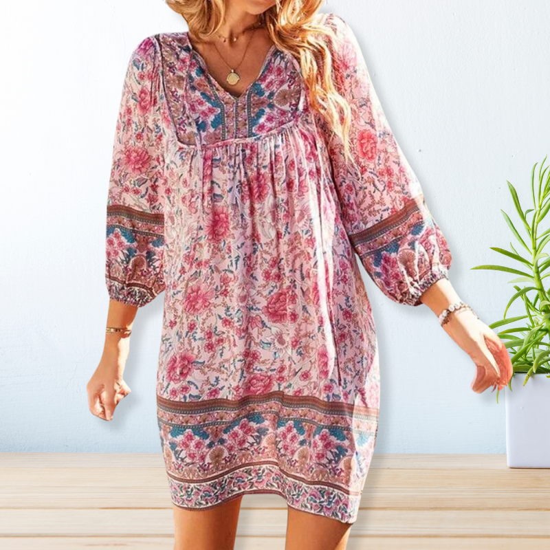 "Women's boho floral summer dress, knee-length, long sleeves, relaxed fit, perfect for sunny days."