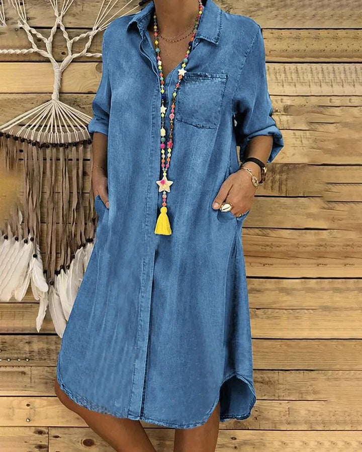 "Women's casual denim midi dress with rolled sleeves and pockets, A-line silhouette, perfect for summer outings."