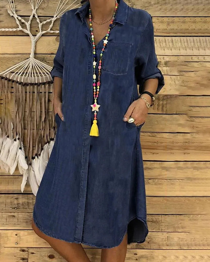 "Women's casual denim midi dress with rolled sleeves and pockets, A-line silhouette, perfect for summer outings."