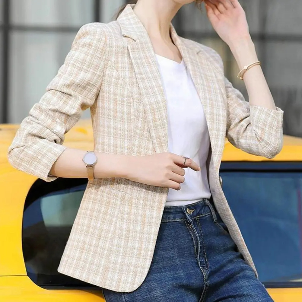 "Women's checkered single-button blazer, elegant tailoring, premium fabric, classic design, versatile for work or casual."