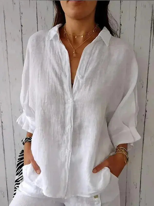Women's chic linen blouse with relaxed fit, lightweight fabric, and elegant style, perfect for warm weather comfort.