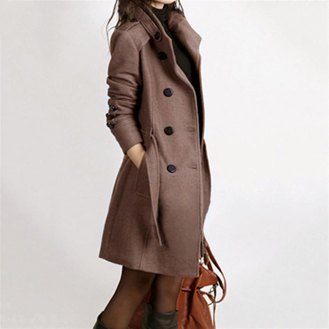 Women's chic long belted coat for autumn, featuring solid color and elegant silhouette, perfect for stylish warmth.
