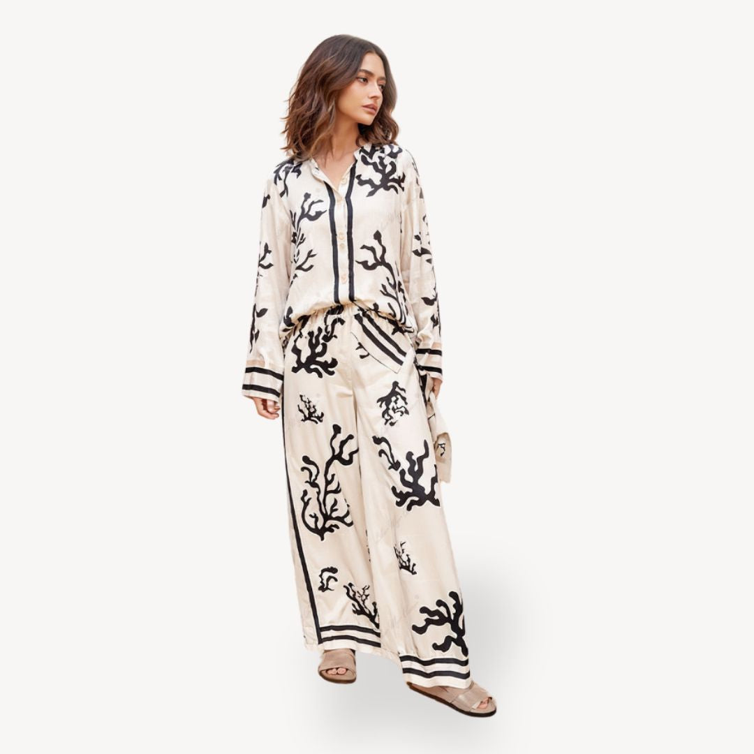 "Womens coral print pajama set, off-white with black coral patterns, long-sleeve top, elegant and stylish sleepwear."