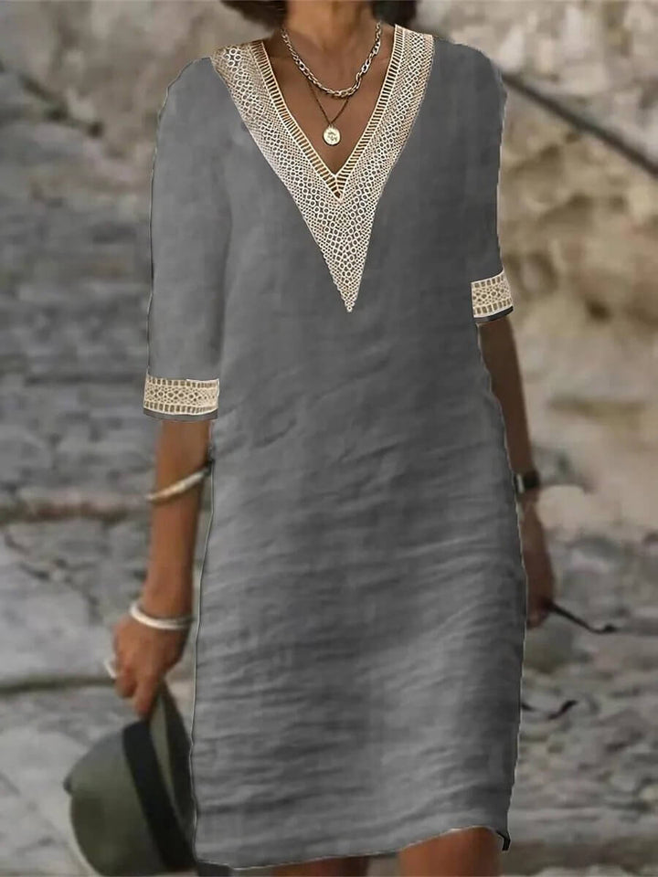 Women's cotton-linen casual V-neck dress, lightweight fabric, breathable for warm weather, relaxed fit, versatile style.