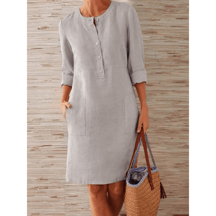 Women's cotton short-sleeve dress with a relaxed fit, breathable and stylish, perfect for casual outings or gatherings.