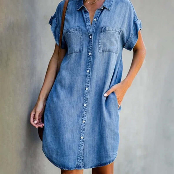 Women's denim shirt dress, short sleeves, button-down front, knee-length, relaxed fit, perfect for casual elegance.