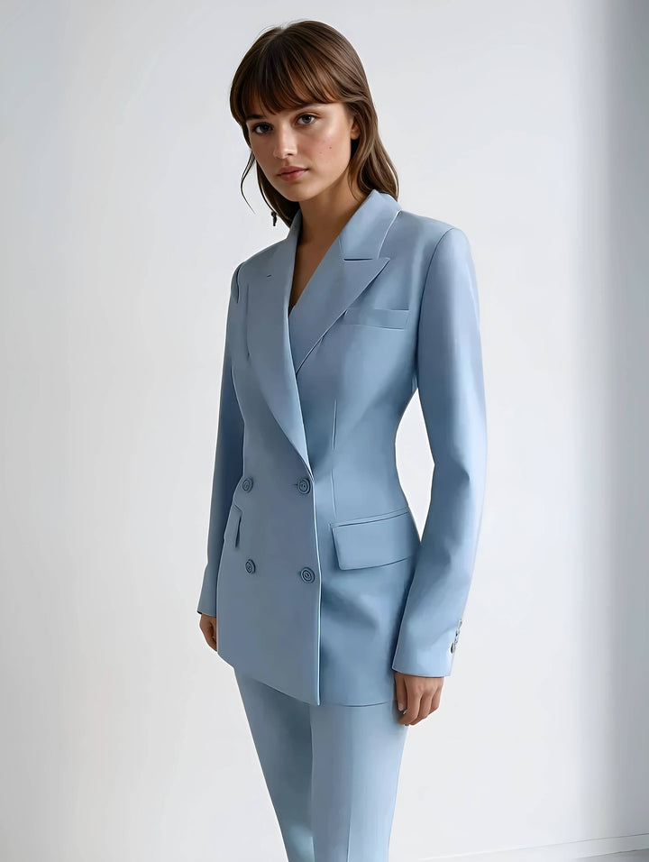 "Womens elegant blazer and trousers set in tailored fit, showcasing sleek silhouette and high-quality fabric for chic style."