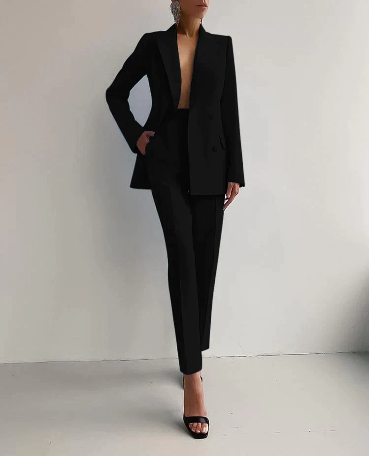 "Womens elegant blazer and trousers set in tailored fit, showcasing sleek silhouette and high-quality fabric for chic style."