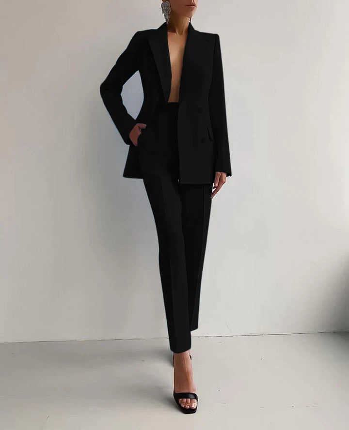 "Womens elegant blazer and trousers set in tailored fit, showcasing sleek silhouette and high-quality fabric for chic style."