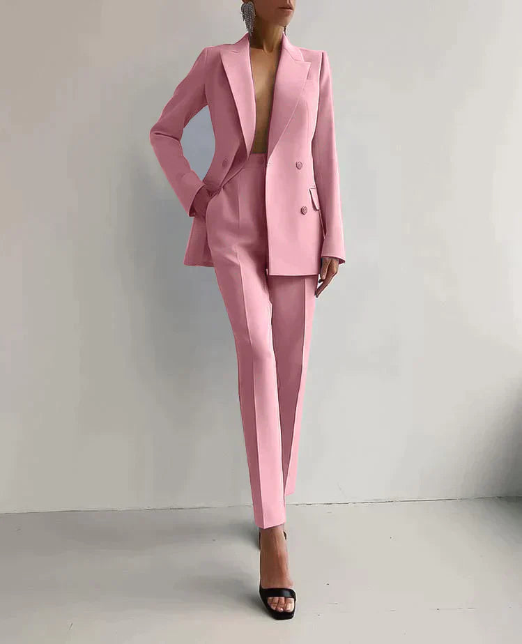 "Womens elegant blazer and trousers set in tailored fit, showcasing sleek silhouette and high-quality fabric for chic style."