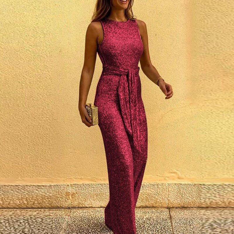 "Women's elegant sequin jumpsuit, dazzling and tailored for evening events, sparkles with every move against a plush lining."
